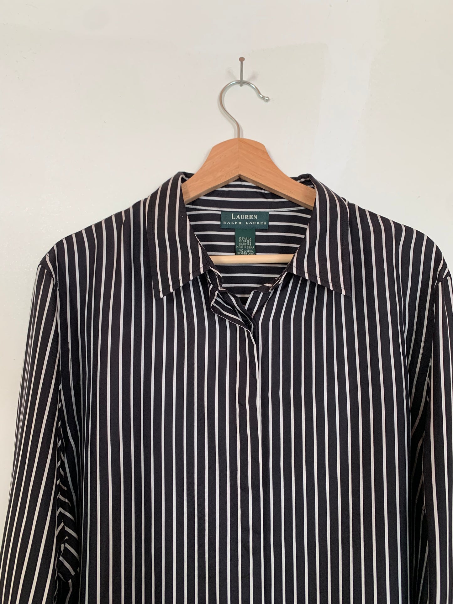 Long-sleeved silk button-up blouse